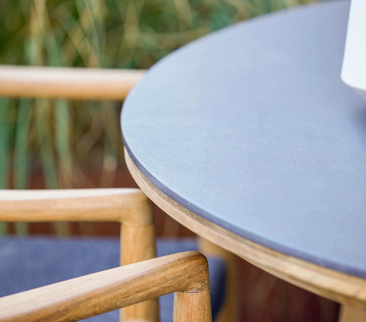 Aspect Teak Dining Table - Round - Cane Line - Outdoor Furniture - Travertine Look Ceramic - HORNE