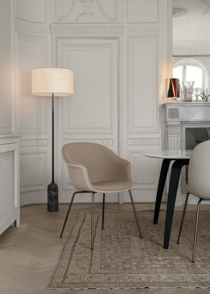 Bat Dining Armchair, Front Upholstered - Antique Brass Base - Gubi - Chairs - Black - Gabriel Tempt - 60152 - HORNE