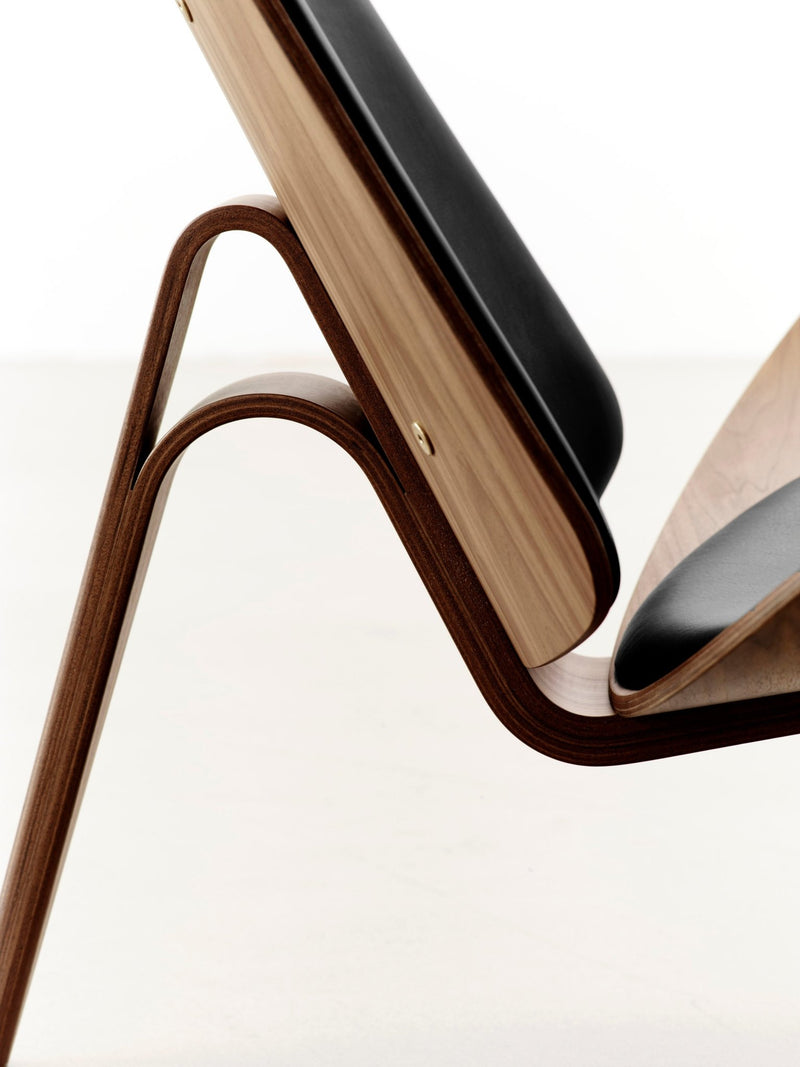 Retro wood and leather shell chair