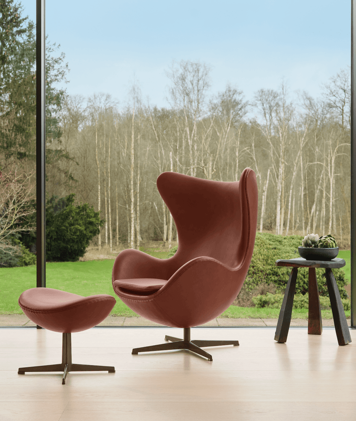 Egg™ Footstool - Fritz Hansen - Stools + Benches + Ottomans - Grace Walnut Leather - Black Lacquer - HORNE